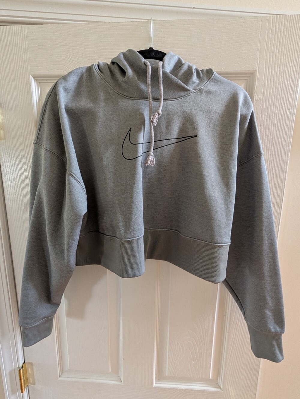 Nike Cropped Hoodie in Light Gray with Black Swoosh